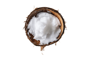 Kokosöl in einer halben Kokosnuss